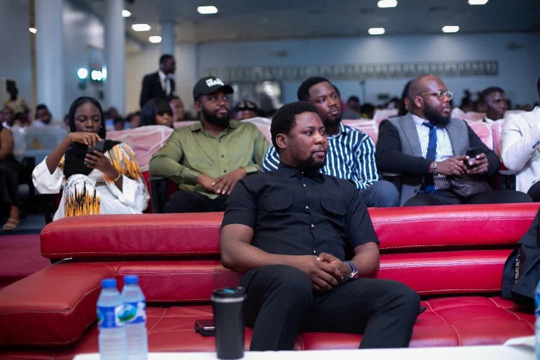 An attendee listening during a Reform Summit session